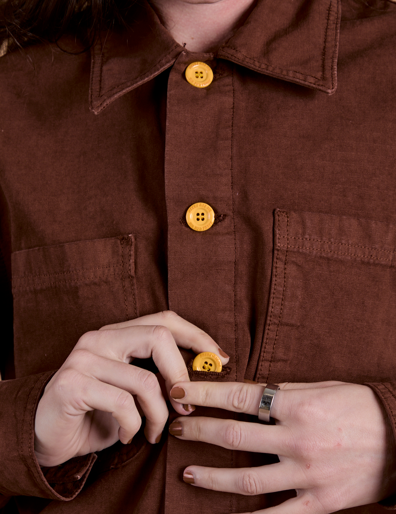 Front close up of Ripstop Field Coat in Fudgesicle Brown on Alex