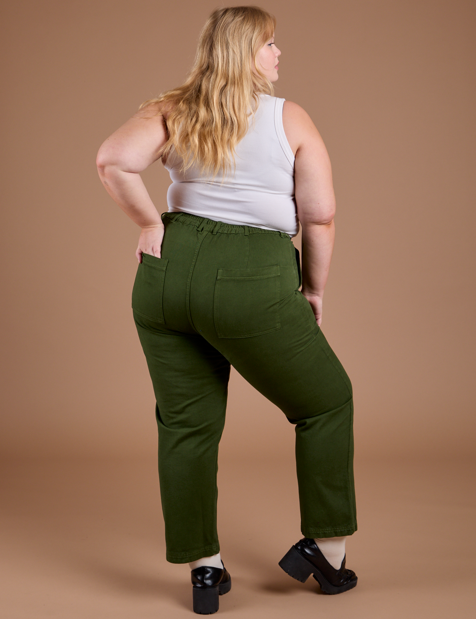 Organic Work Pants in Evergreen back view on Juliet