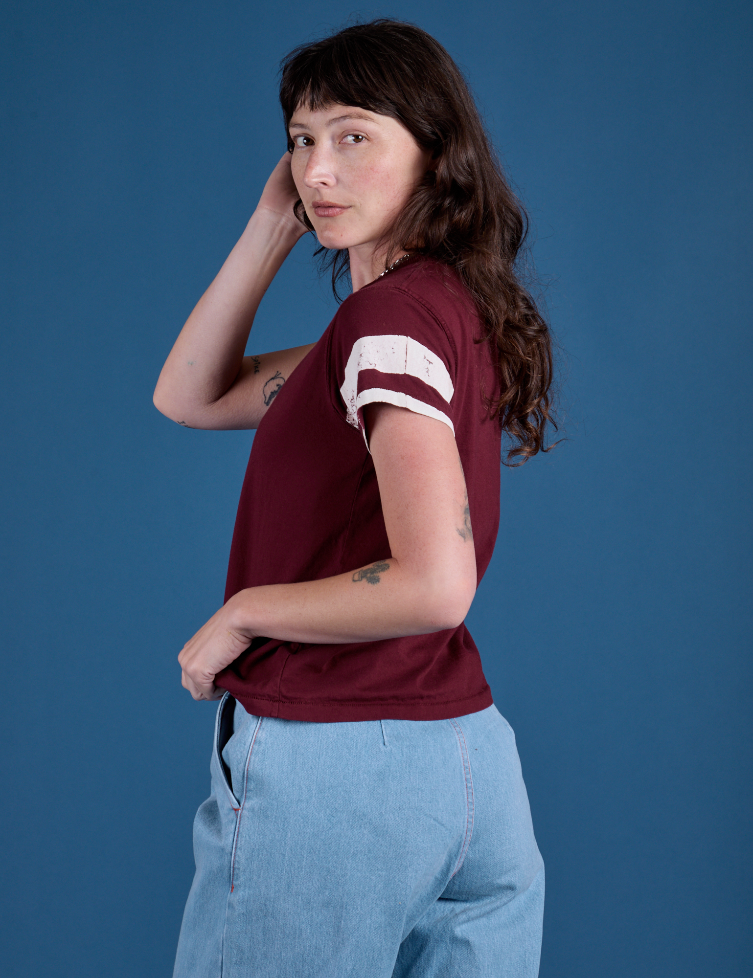 Side view of Painted Vintage Tee in Red Wine on Alex