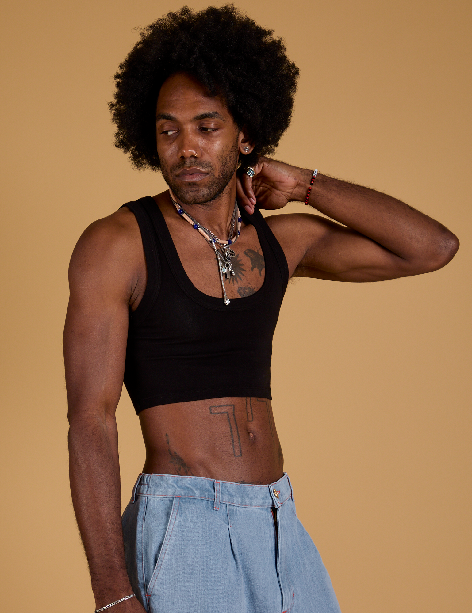 Angled front view of Mini Tank in Basic Black on Jerrod