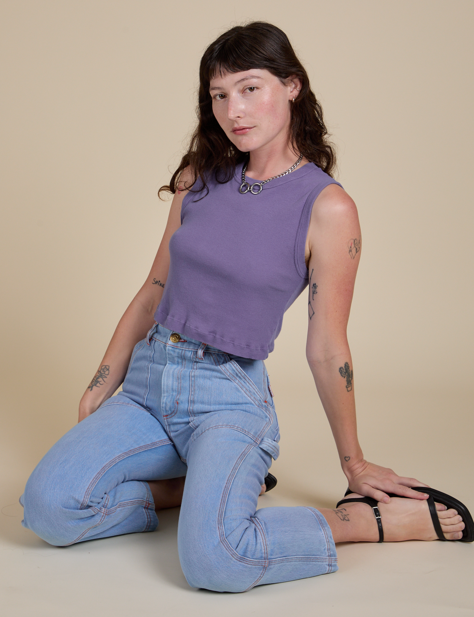 Muscle Tee in Faded Grape and light wash Carpenter Jeans on Alex