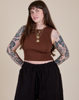 Sydney is 5'9" and wearing XXS Muscle Tee in Fudgesicle Brown