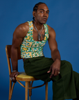 Jerrod is wearing Cropped Tank Top in Spring Quilt Print and evergreen Drop Pocket Cargo Pants