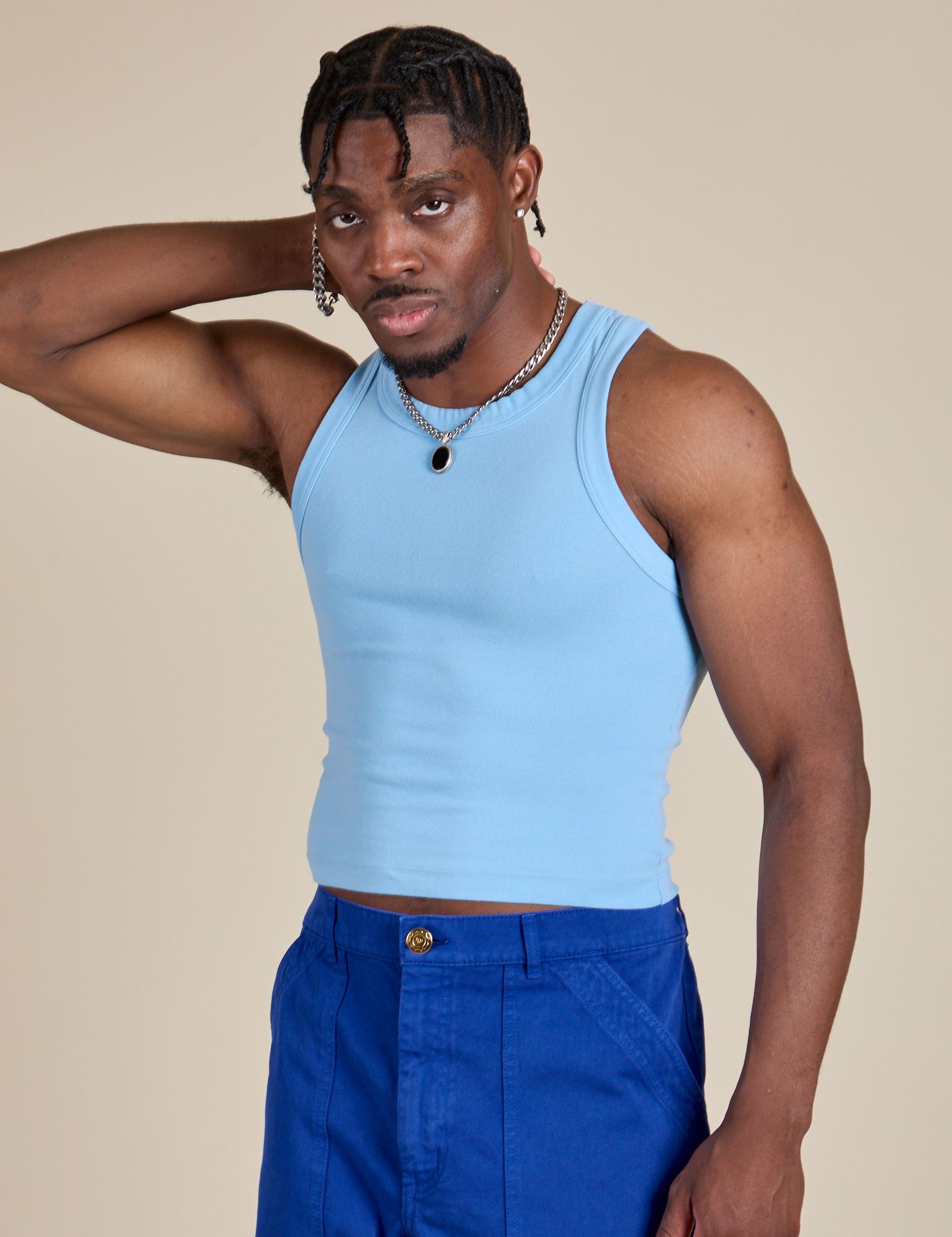 Racerback Tank in Baby Blue angled front view on Isaac