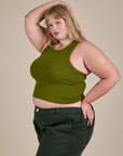 Racerback Tank in Summer Olive angled front view on Juliet
