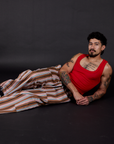 Striped Drop Pocket Pants in Retro Rainbow and Cropped Tank Top in Mustang Red worn by Jesse