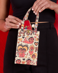 Hot Stuff Printed Cell Phone Tote held by model