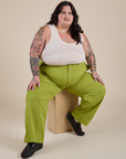 Work Pants in Gross Green and Cropped Tank in Vintage Tee White on Sam