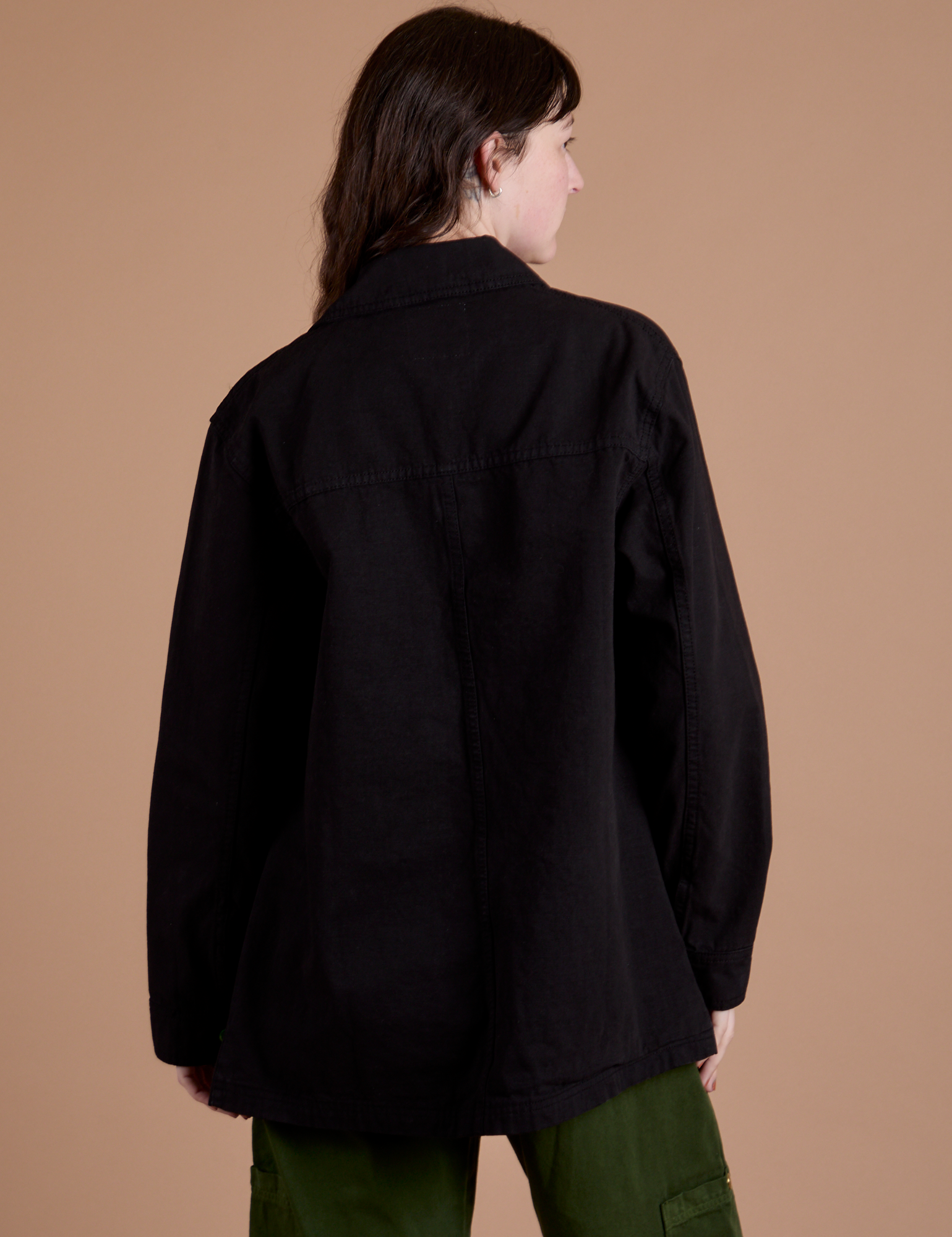 Ripstop Field Coat in Basic Black back view on Alex