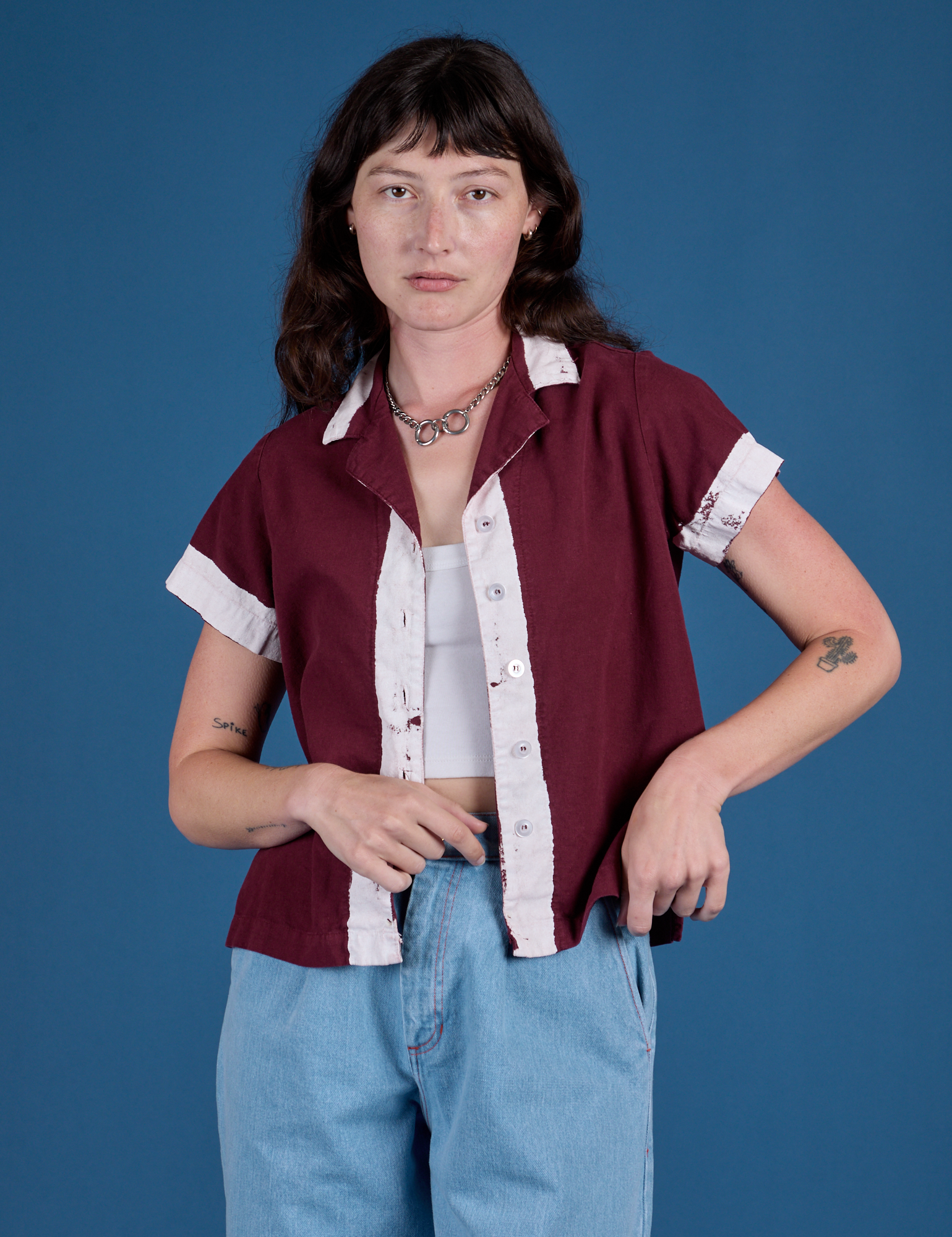 Alex is 5’8” and wearing P Painted Pantry Button-Up in Red Wine