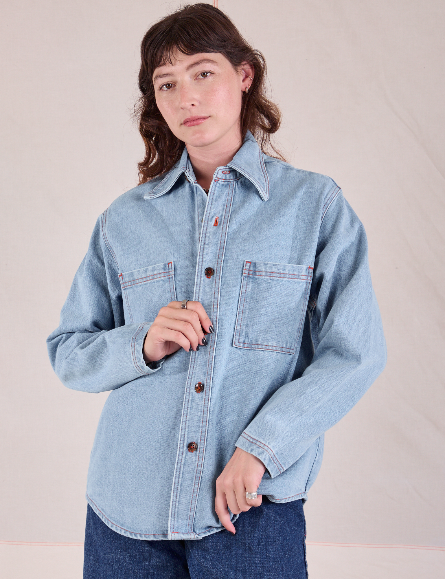 Alex is wearing Denim Overshirt in Light Wash