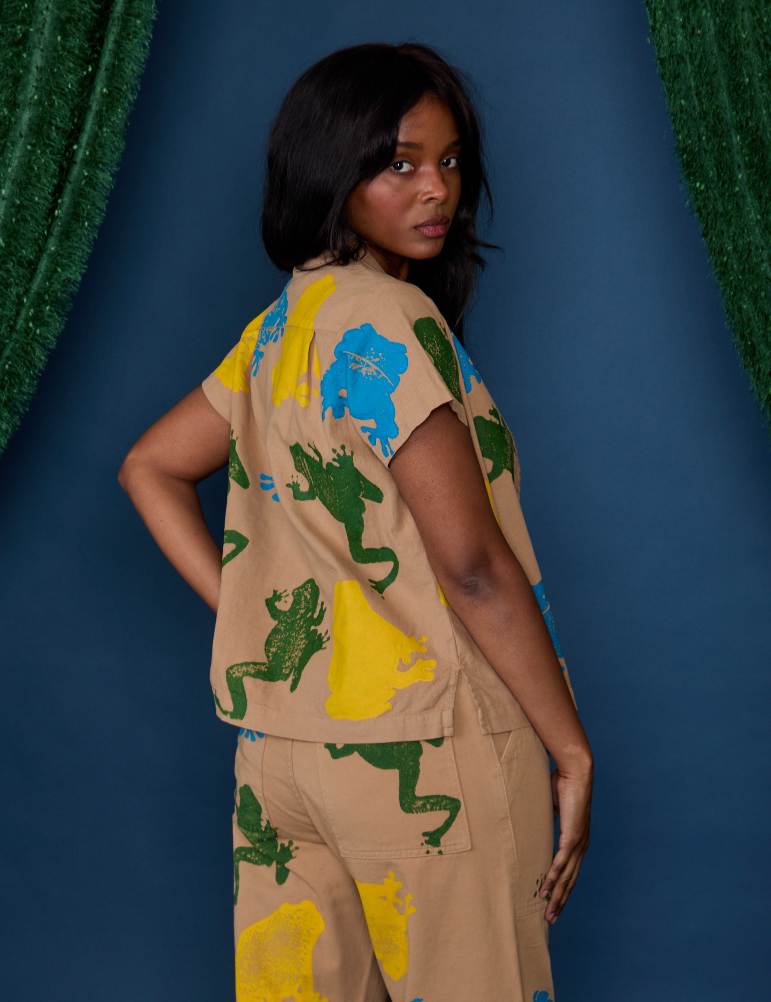 Angled back view of Paintstamped Pantry Button-Up in Froggy on Kandia