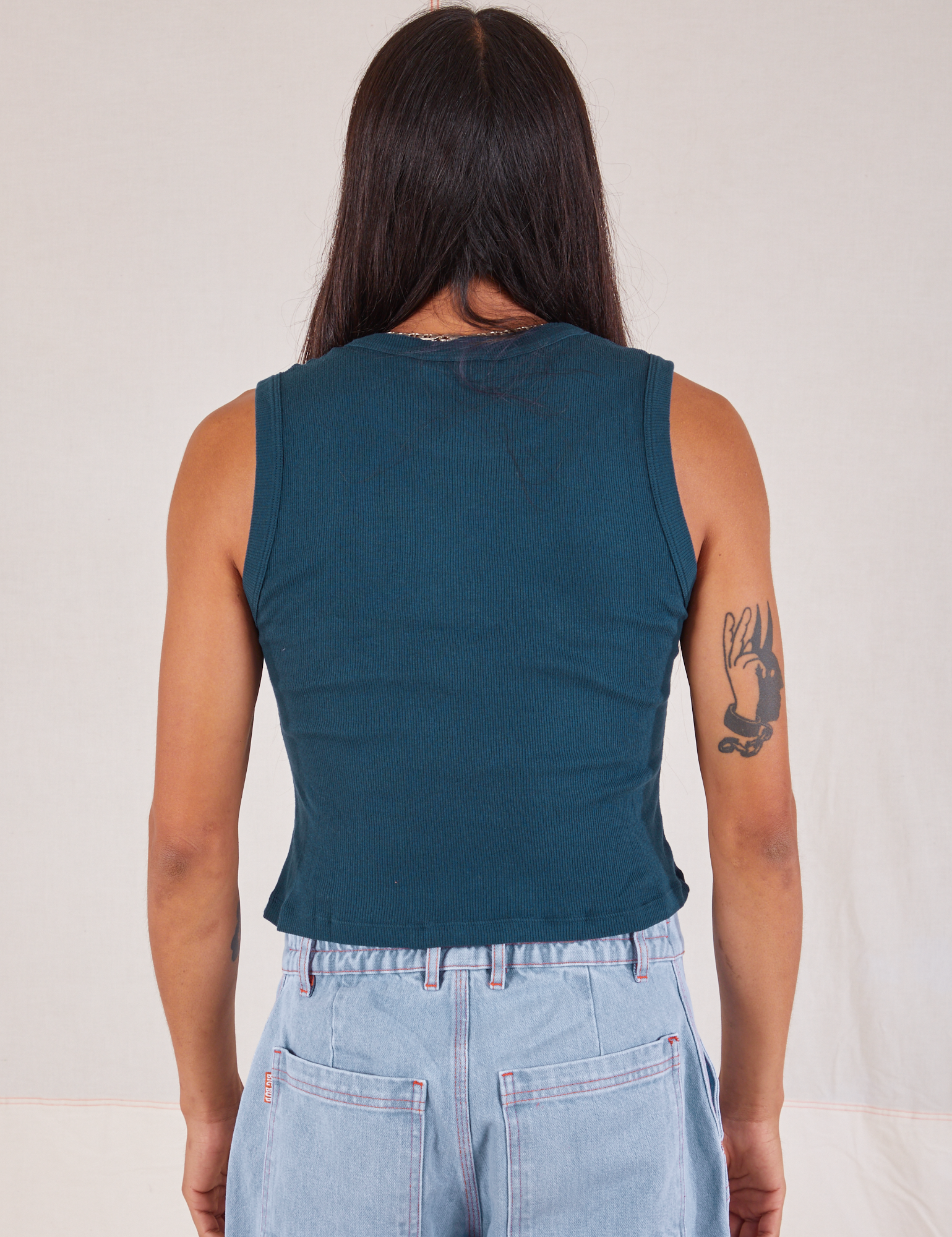 Muscle Tee in Lagoon back view on Anthony