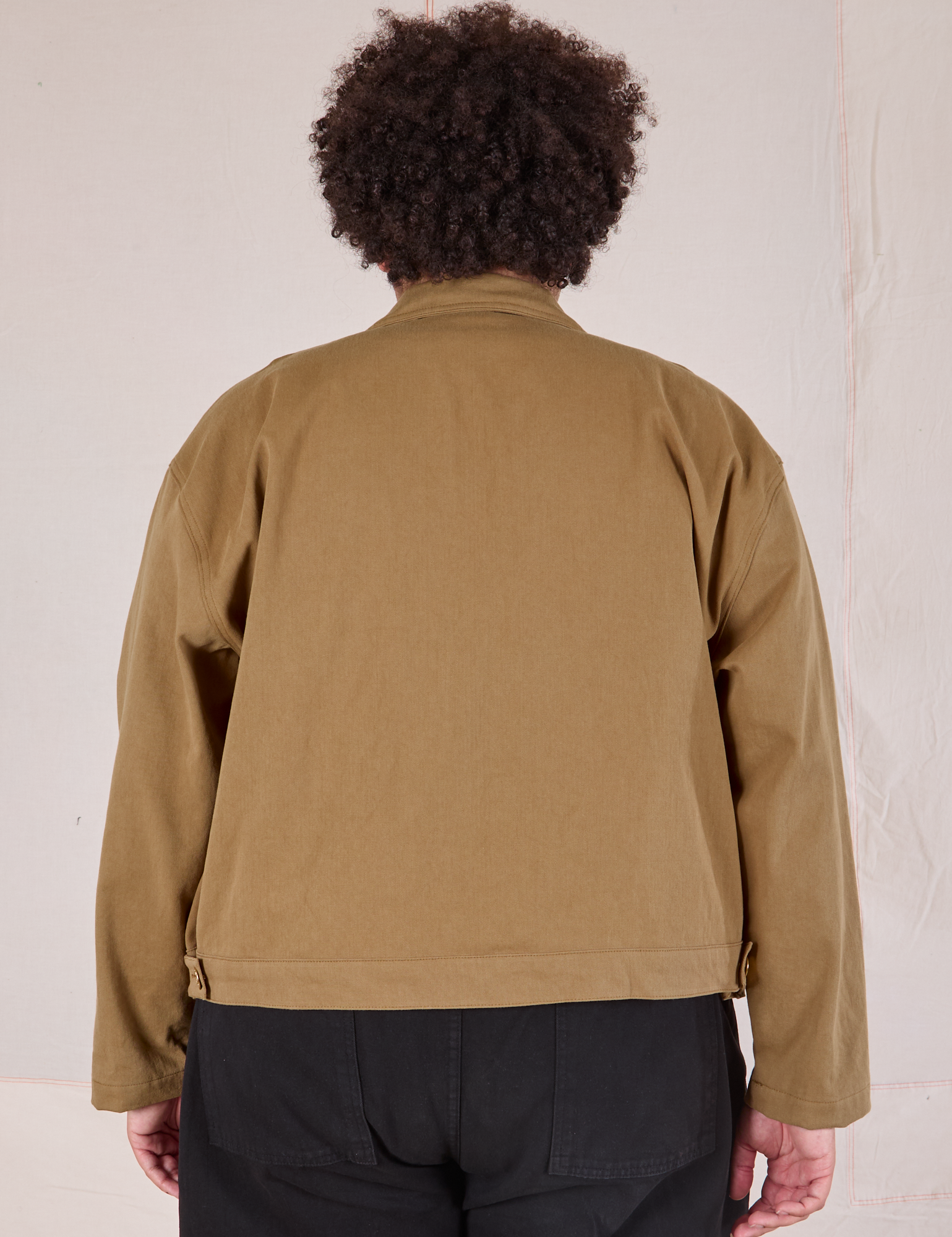 Mechanic Jacket in Desert Brown back view on Miguel