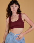 Alex is 5’8” and wearing P Mini Tank in Red Wine