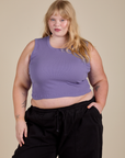 Juliet is 5’7” and wearing M Muscle Tee in Faded Grape