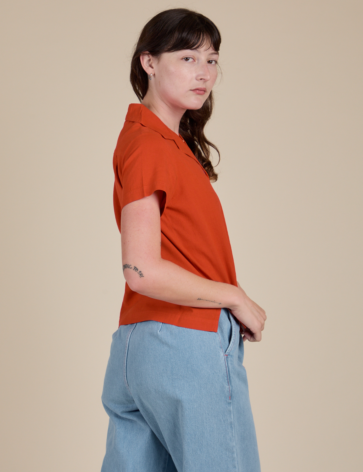 Pantry Button-Up in Chili Red side view on Alex