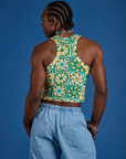 Back view. of Deep-Cut Racerback Tank in Spring Quilt Print on Jerrod