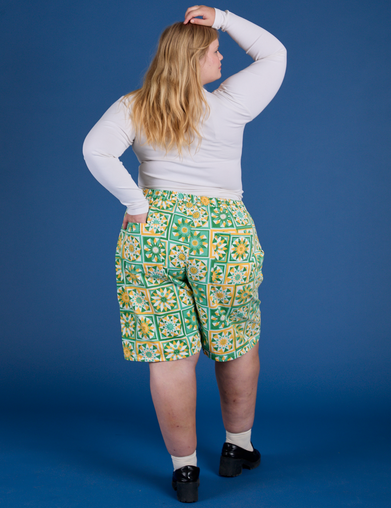 Longline Work Shorts in Spring Quilt Print back view on Juliet