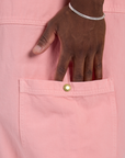 Close up of Isaac's hand in the side pocket of Drop Pocket Cargo Pants in Baby Pink