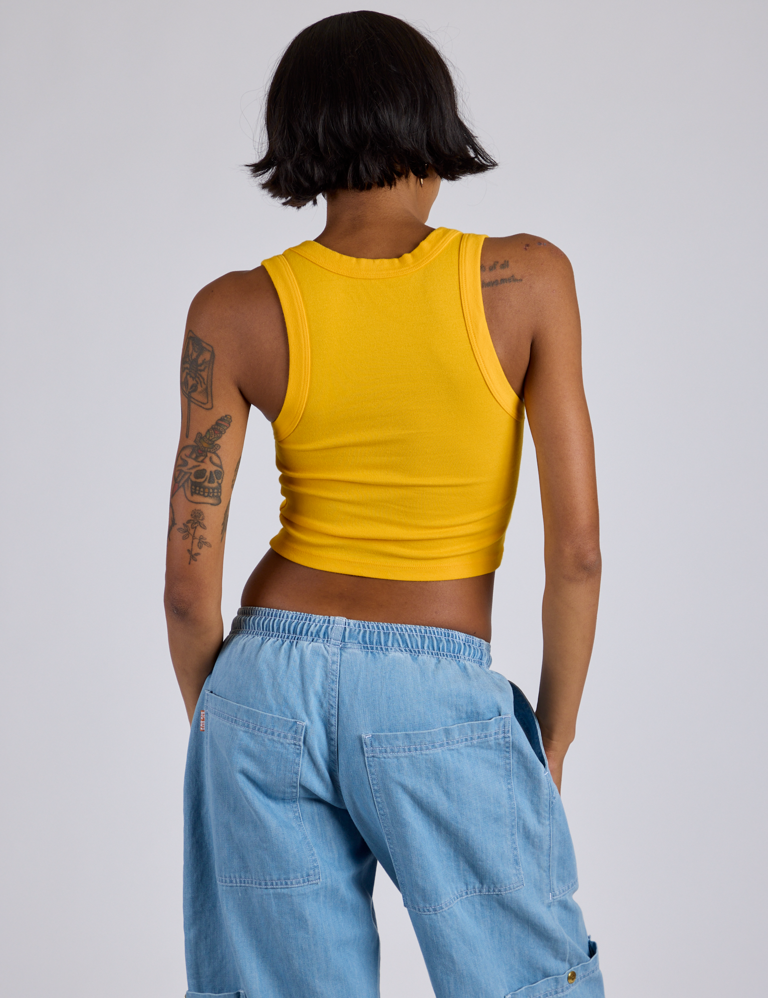 Cropped Tank Top in Sunshine Yellow back view on Kira