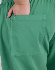 Close up of Juliet's hand in the back pocket of Drop Pocket Cargo Pants in Seafoam Green