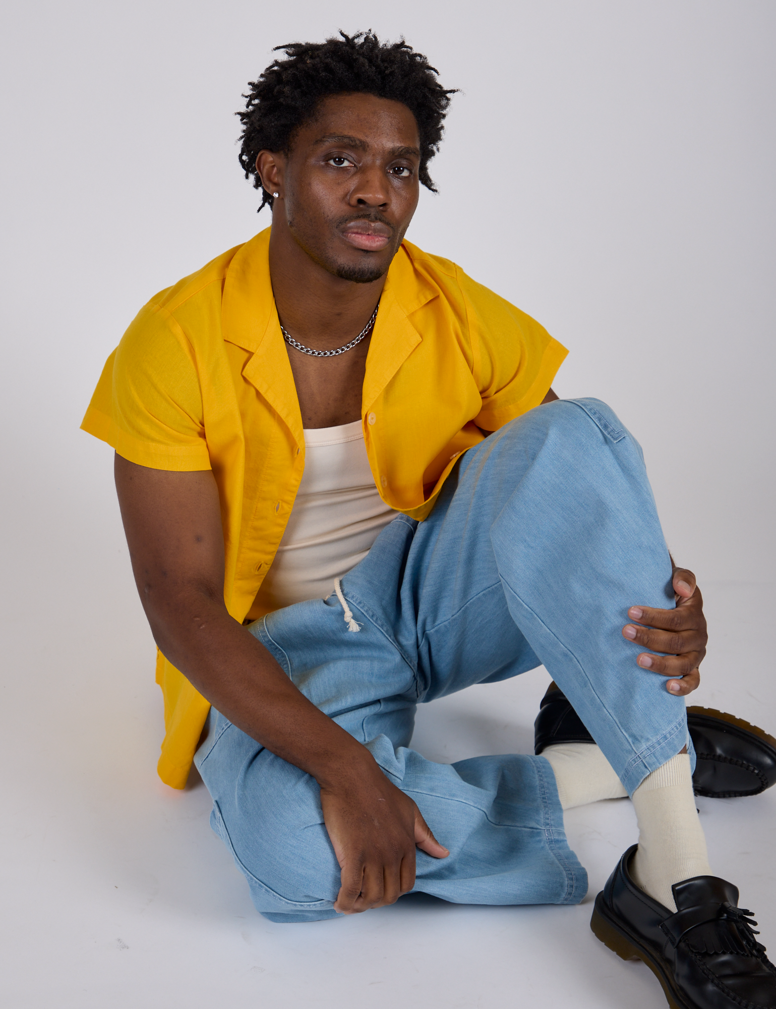 Pantry Button-Up in Sunshine Yellow and light wash Denim Drop Pocket Pants on Isaac