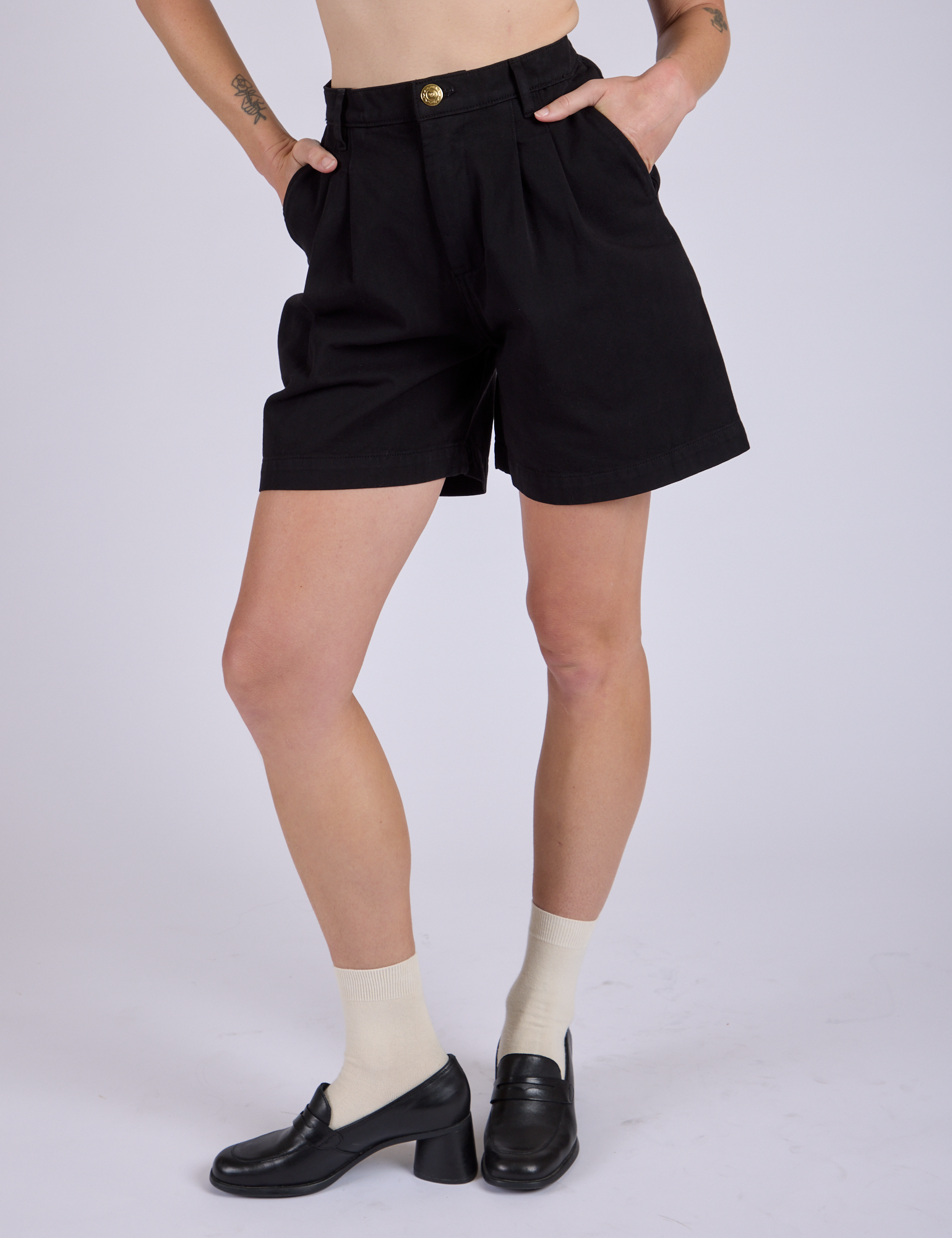 Front close up of Pleated Trouser Shorts in Basic Black on Alex