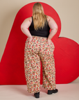 Back view of Hot Stuff Drop Pocket Cargo Pants and black Cropped Tank on Juliet