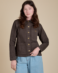 Alex is 5'8" and wearing P Denim Work Jacket in Espresso Brown
