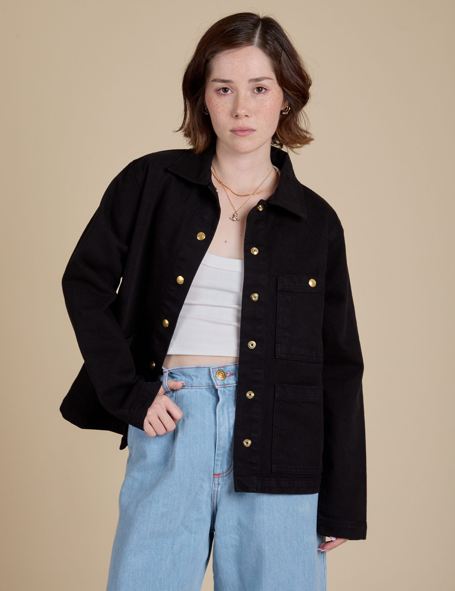 Hana is 5'3" and wearing P Work Jacket in Basic Black