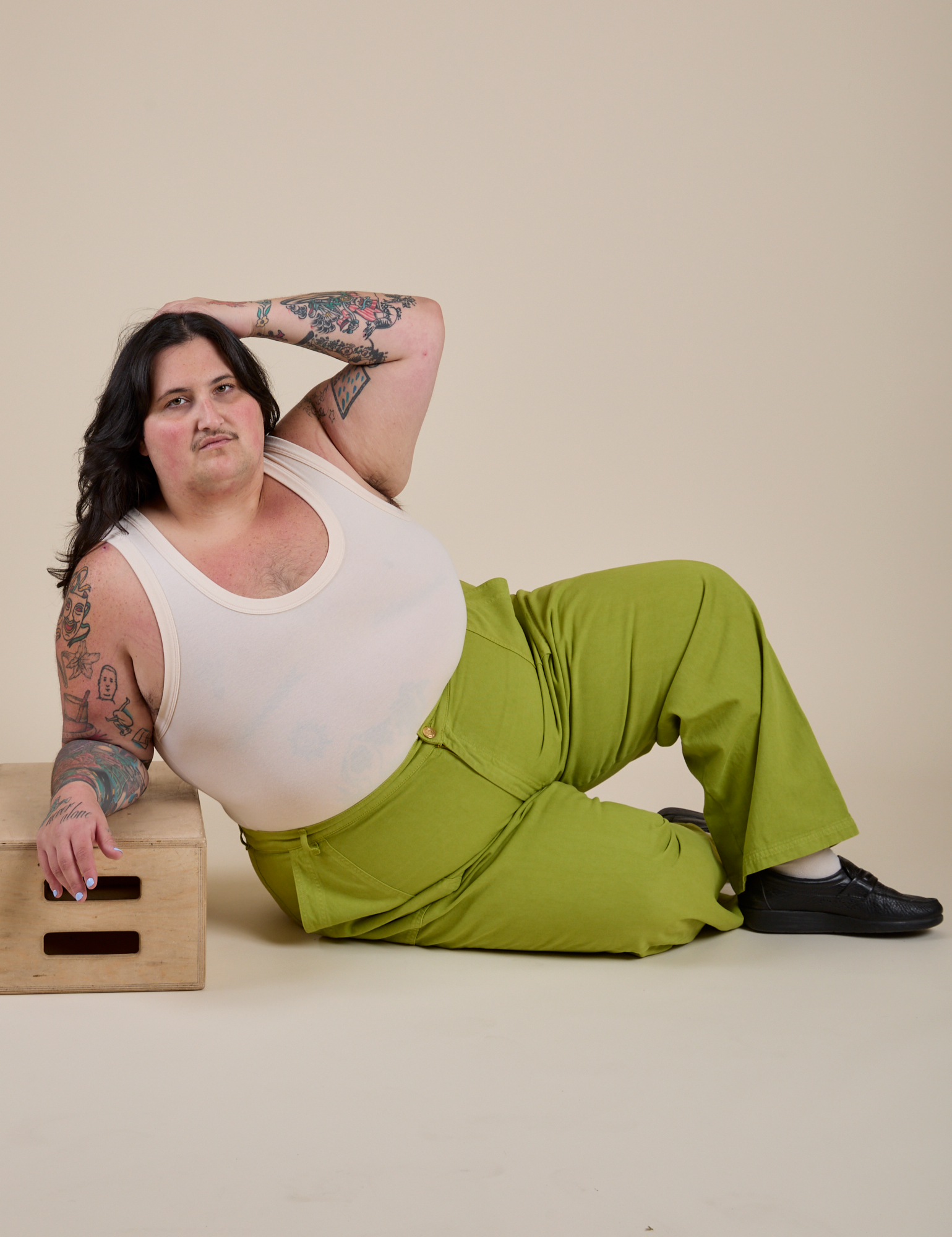 Work Pants in Gross Green and vintage tee white Cropped Tank on Sam
