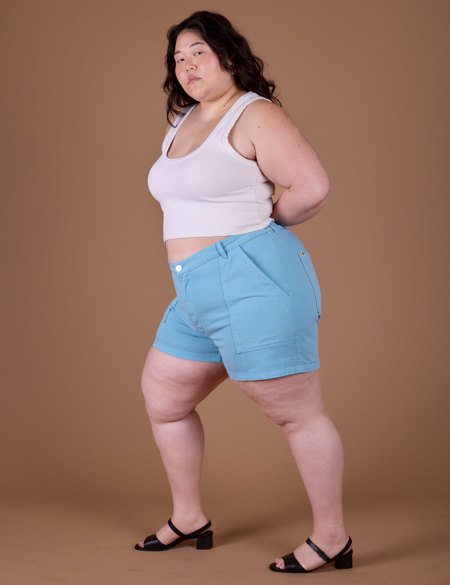 Side view of Classic Work Shorts in Baby Blue and vintage off white Cropped Tank