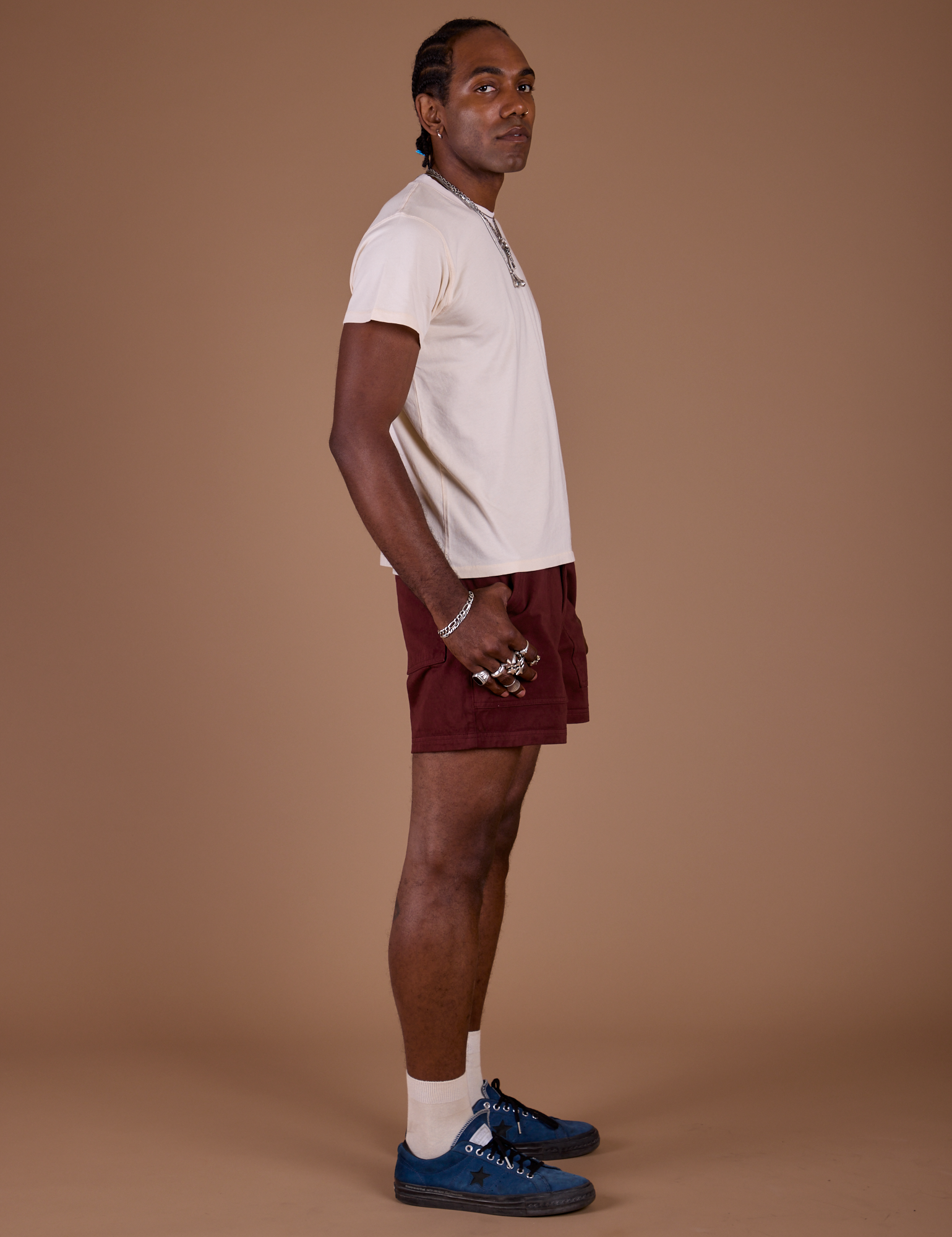 Side view of Classic Work Shorts in Red Wine and Organic Vintage Tee in Vintage Off White on Jerrod