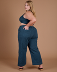 Action Pants in Lagoon angled back view on Juliet