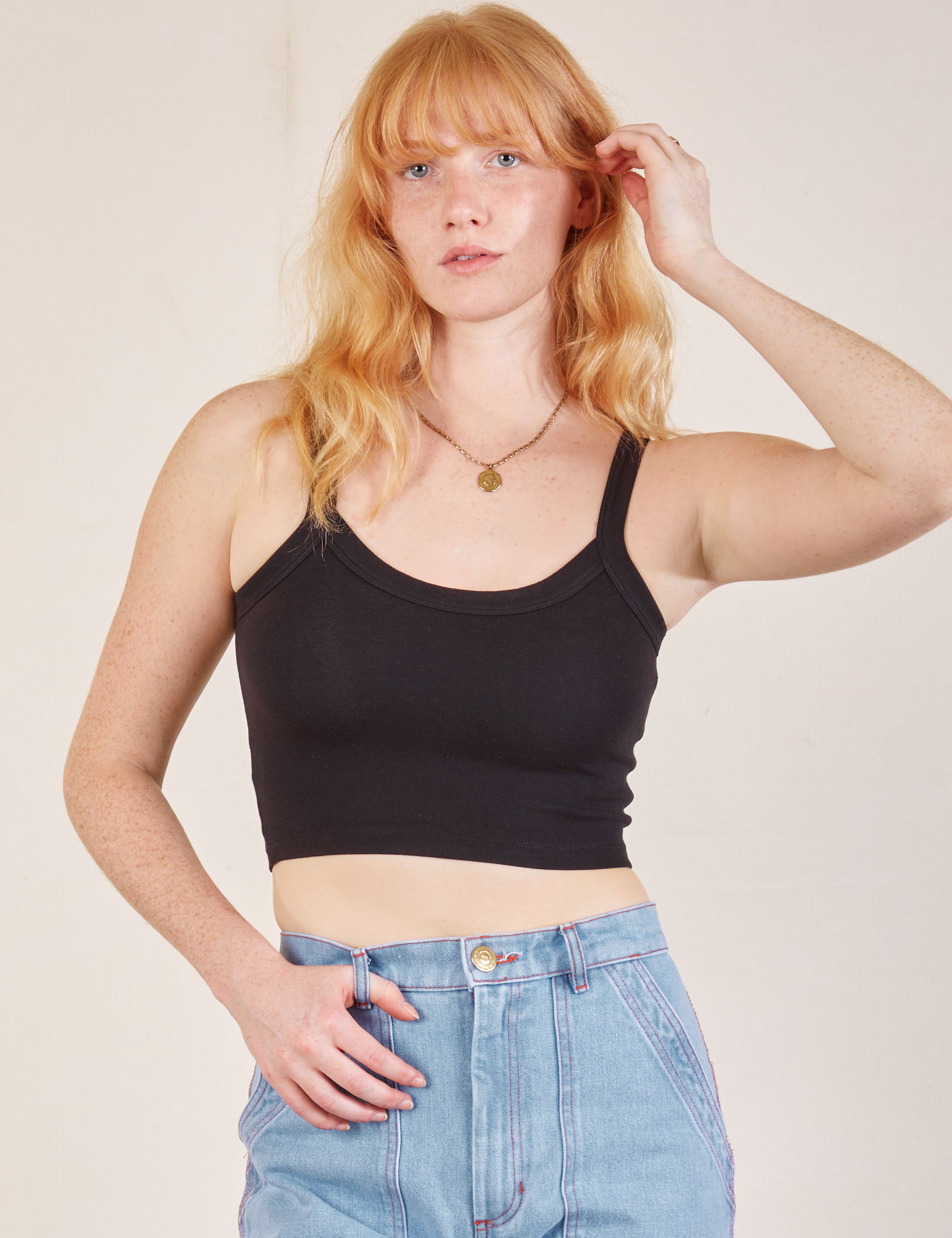 Margaret is 5’11” and wearing P Cropped Cami in Basic Black