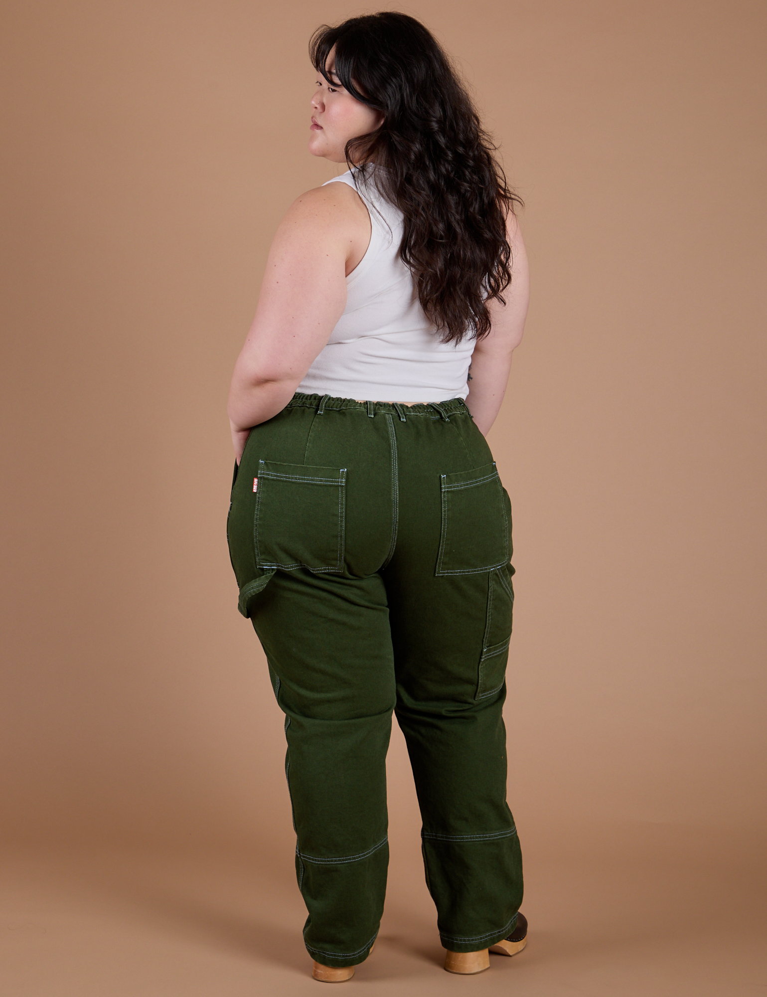 Carpenter Jeans in Evergreen back view on Ashley