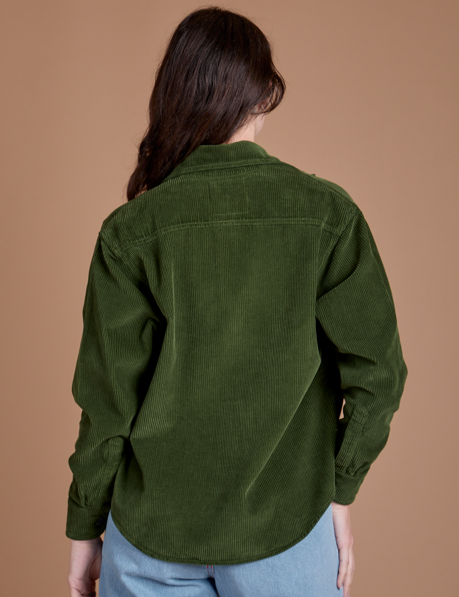 Back view of Cropped Corduroy Overshirt in Evergreen on Alex
