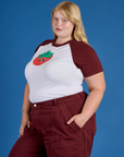 Angled front view of Produce Raglan Tee in Strawberry on Juliet