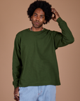 Jerrod is 6’3” and wearing M Long Sleeve Burly Tee in Evergreen
