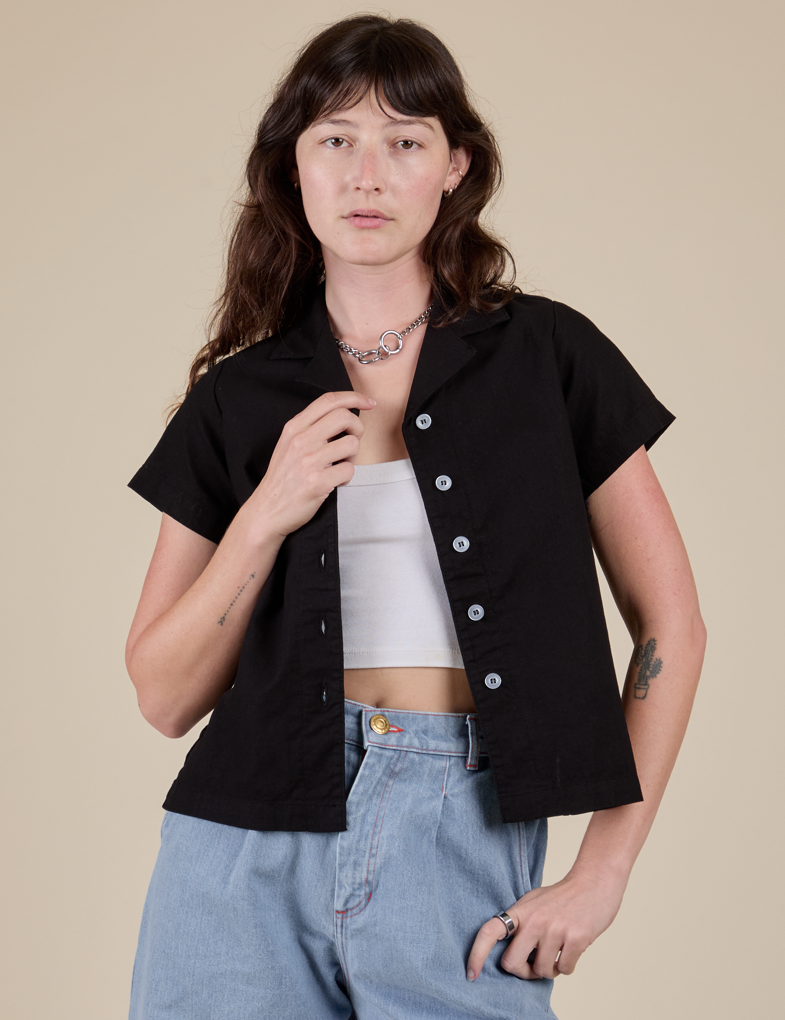 Alex is 5’8” and wearing P Pantry Button-Up in Basic Black