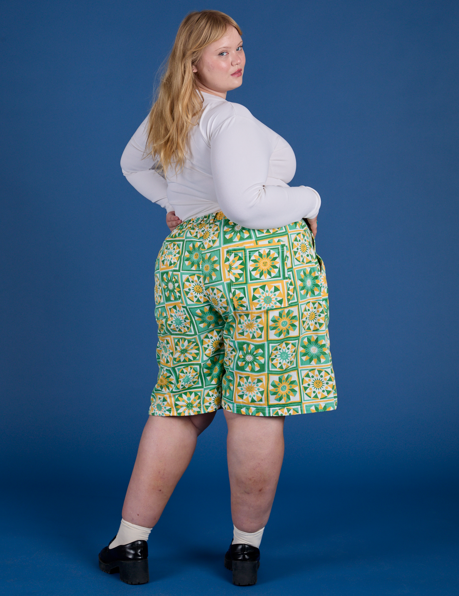 Longline Work Shorts in Spring Quilt Print angled back view on Juliet