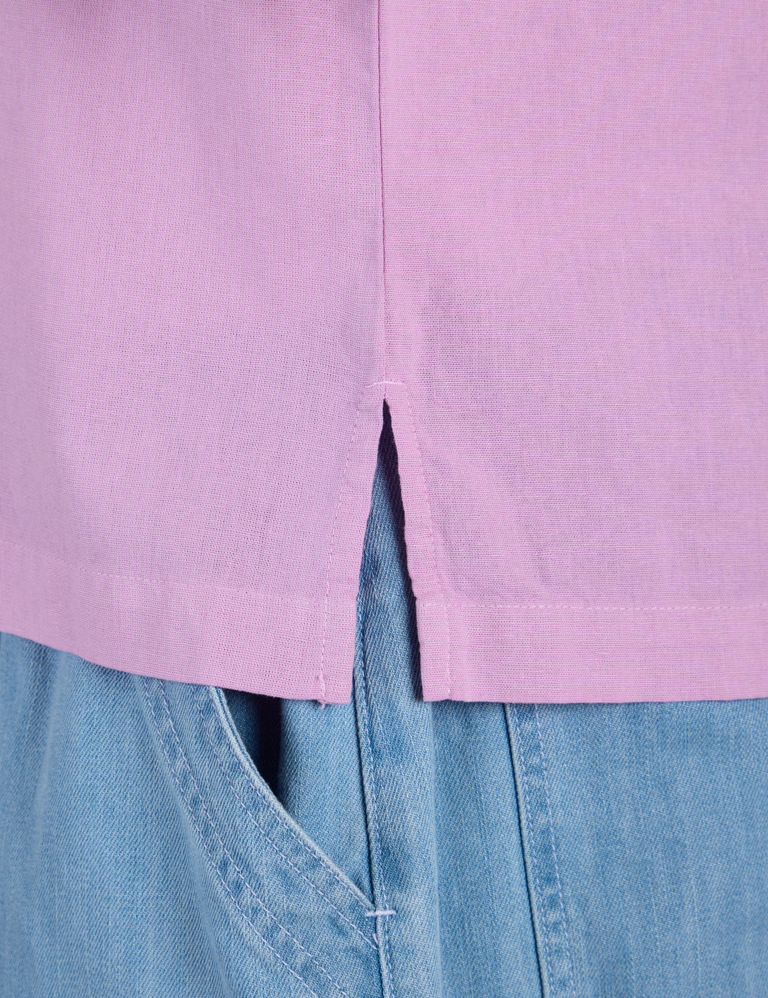Pantry Button-Up in Lilac Purple side vent close up on Juliet