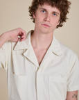 Short Sleeve Jumpsuit in Vintage Tee White front close up on Quinn