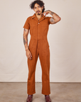 Jesse is 5'7" and wearing S Short Sleeve Jumpsuit in Burnt Terracotta