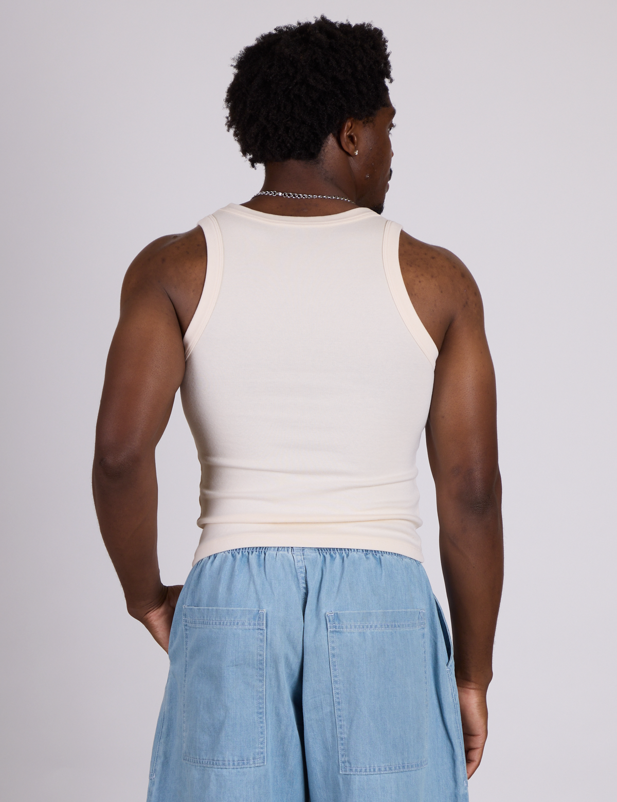 Back view of The Tank Top in Vintage Tee Off-White on Isaac