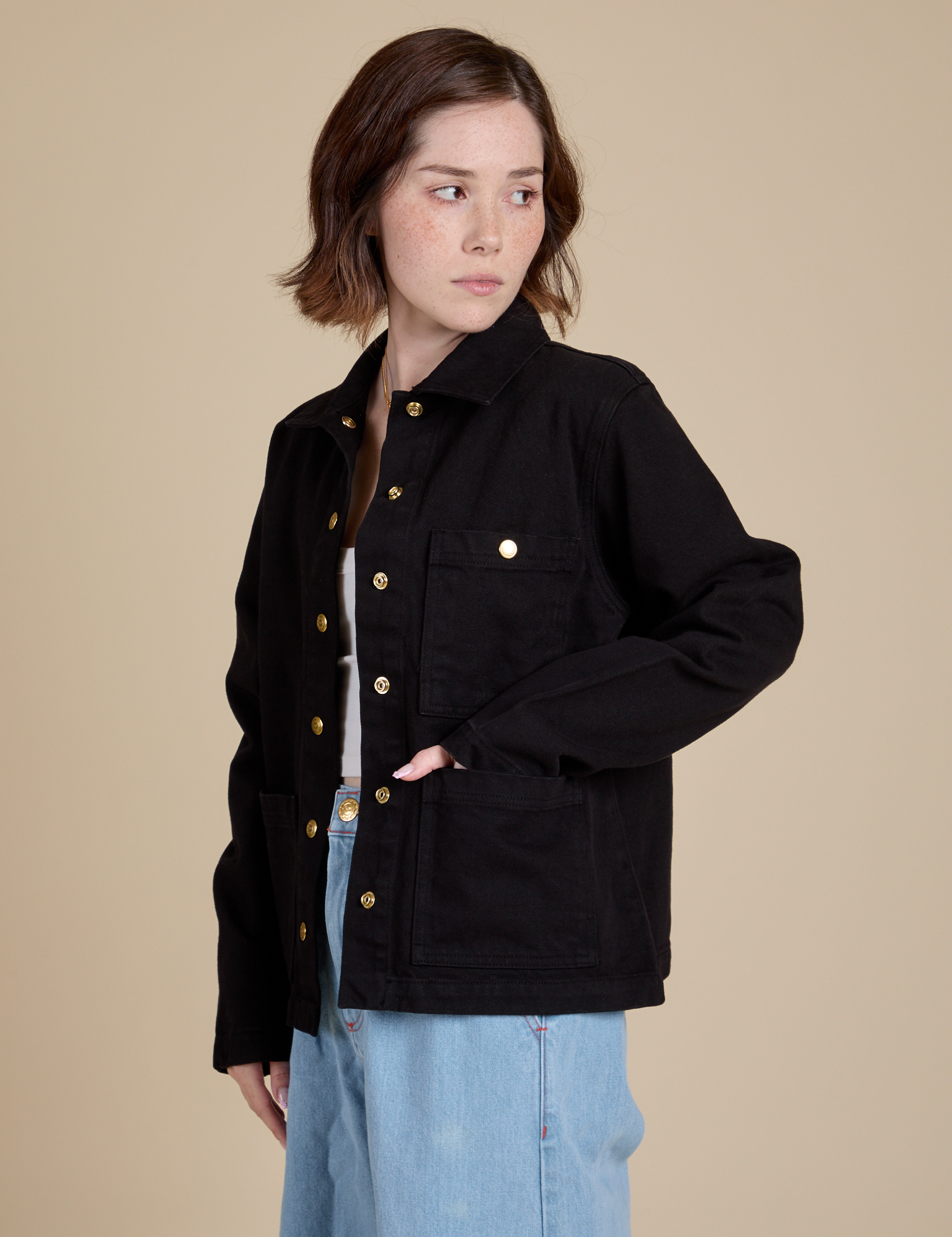 Angled front view of Work Jacket in Basic Black on Hana