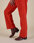 Work Pants in Mustang Red close up pant leg side view on Jesse
