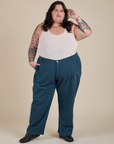 Sam is wearing Work Pants in Lagoon and vintage tee off-white Tank Top