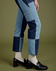 Pant leg side view close up of Mismatched Denim Carpenter Jeans on Alex